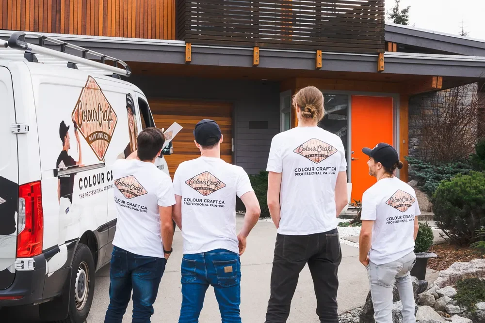 Uniformed Colour Craft painting crew arriving at a client home