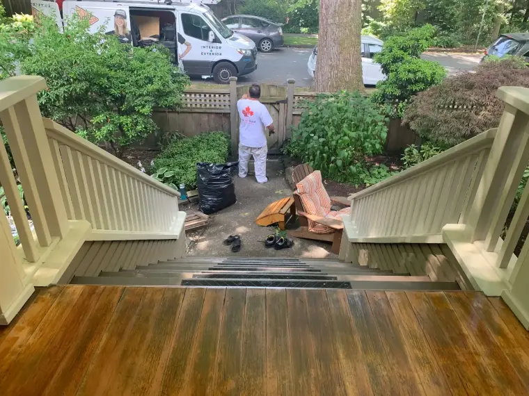 Deck before staining, crew preparing the surface