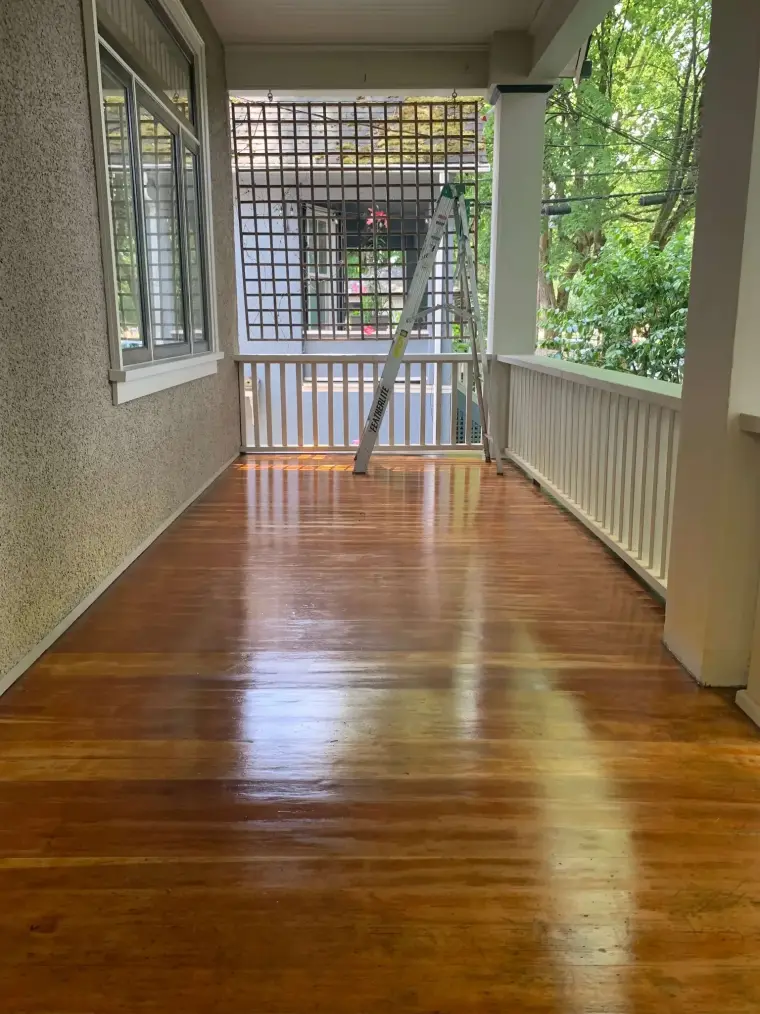 Freshly stained porch deck floor by Colour Craft Painting