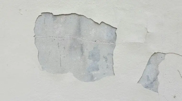 Wall being repaired and filled before painting