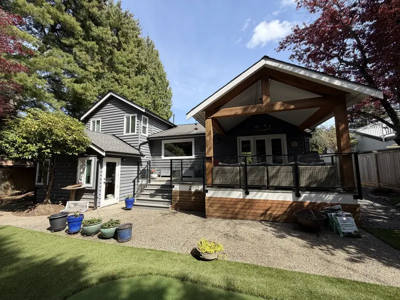 Tsawwassen Delta home with dark charcoal siding before repaint
