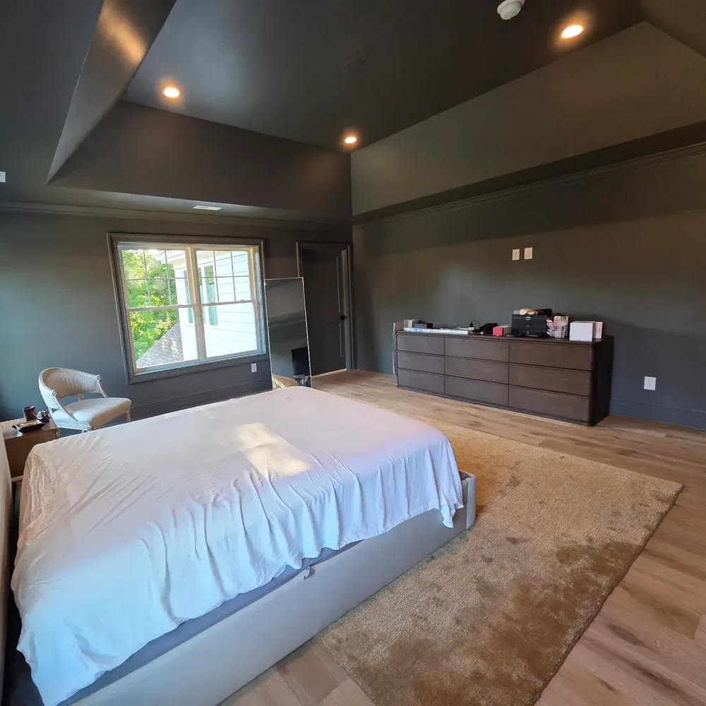 Main bedroom colour-drenched in a deep grey-green, walls, ceiling, doors and trim, by Colour Craft Painting